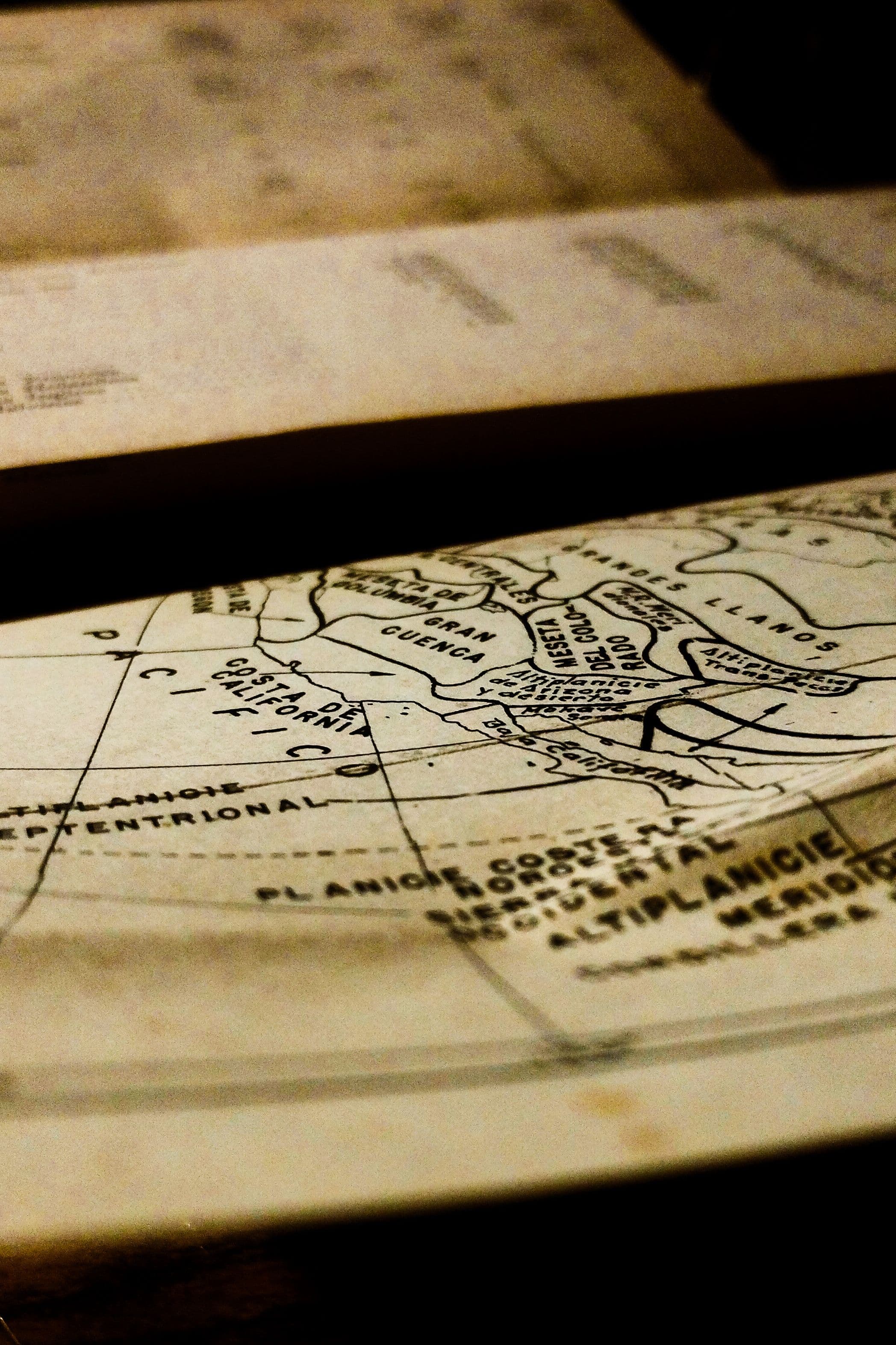 Close-up of an antique paper world map, representing where the other side of a payment is located